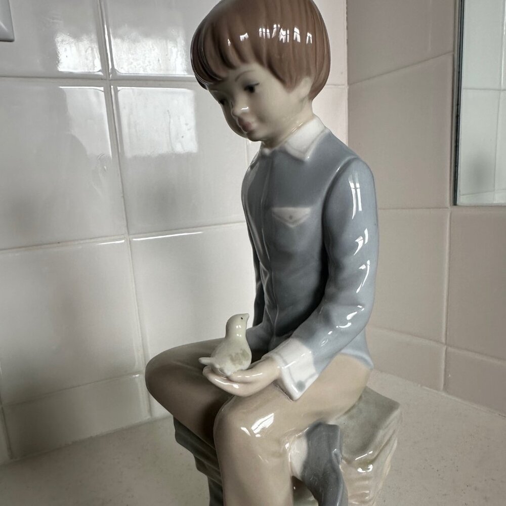 Vintage ZAPHIR LLADRO SEATED BOY WITH BIRD 10” Glazed Porcelain Figurine